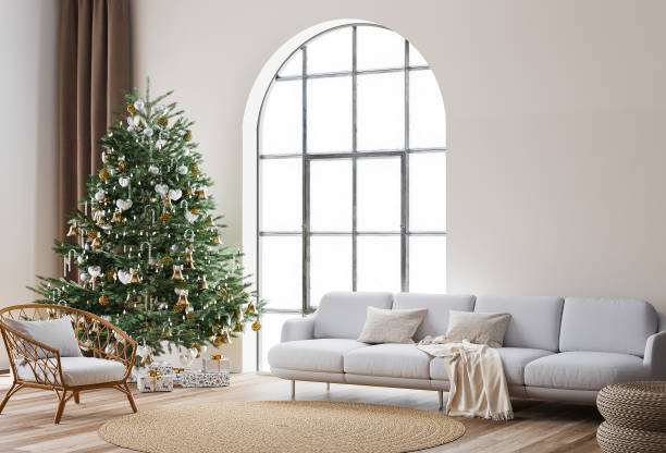 istock Living Room Christmas interior in Scandinavian style. Christmas tree with gift boxes. White sofa on wall Mockup 1296833385