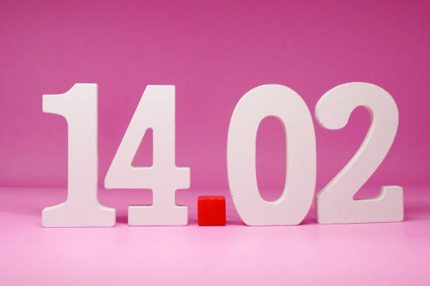 istock 14 02 ( February 14 ) Isolated pink Background with Copy Space - valentine day anniversary concept 1296835382