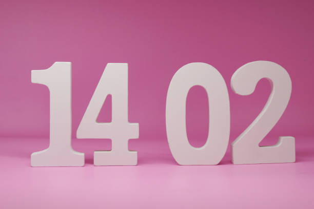istock 14 02 ( February 14 ) Isolated pink Background with Copy Space - valentine day anniversary concept 1296835403
