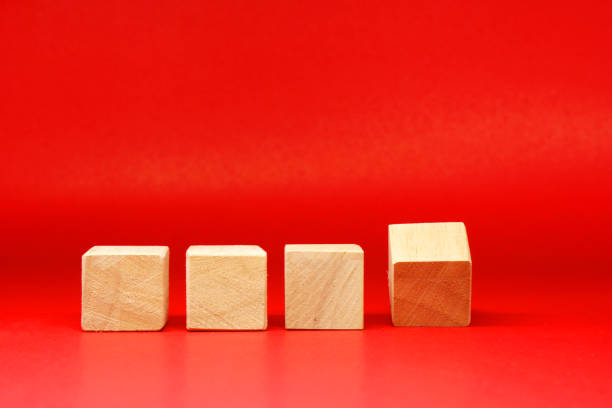 istock Mockup 4 wooden square block object on red background and copy space - Creative Word Editor Template 1296835678