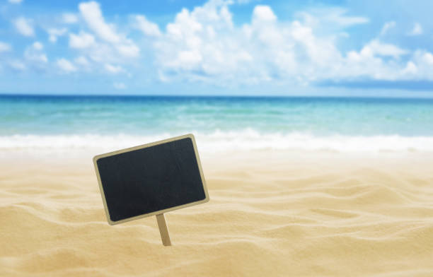 istock Sand, sea, sky and beach background 1296838516