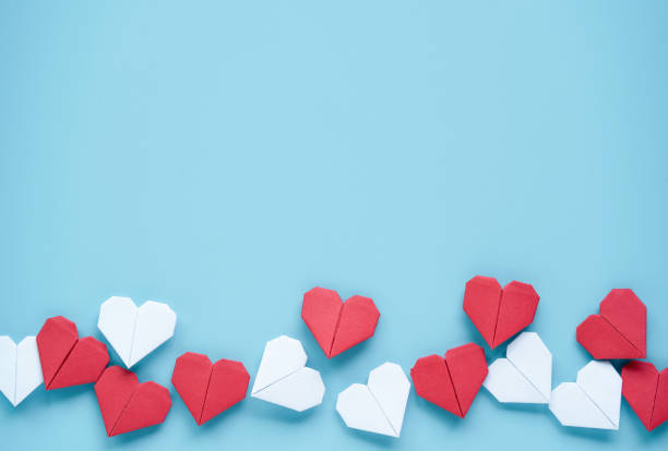 istock Valentine’s Day concept, Red and white heart on blue background. 1296839038