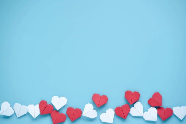 istock Valentine’s Day concept, Red and white heart on blue background. 1296839227