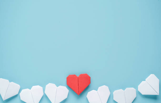 istock Valentine’s Day concept, Red and white heart on blue background. 1296839343