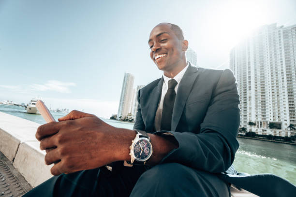 istock businessman make a phone call in miami 1296842434
