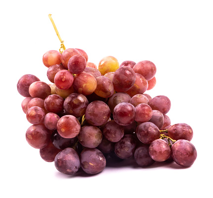 Bunch of grapes on white background. Variety - Red Globe with large, seeded red grapes. Isolated high quality photo