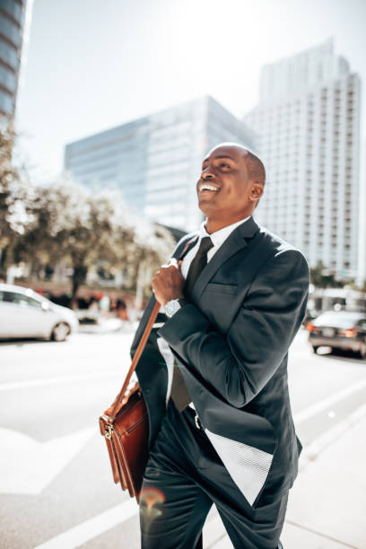 istock business man on rush on the street 1296844779