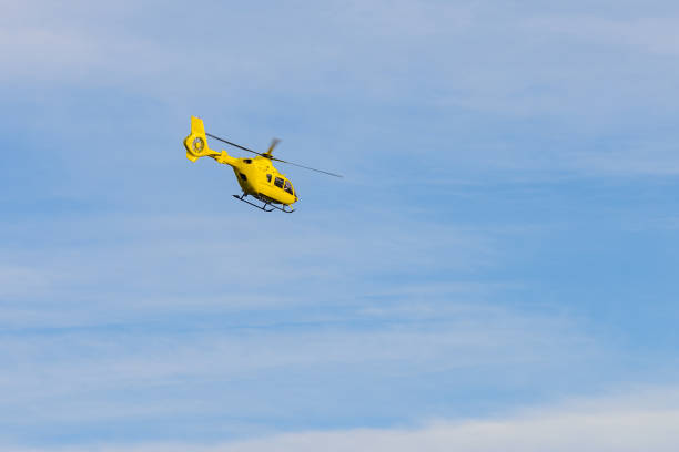 istock helicopter flying against the blue sky 1296846644
