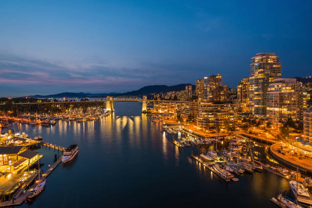 istock Vancouver, British Columbia, Canada, False Creek and Downtown Buildings at Dusk 1296846763