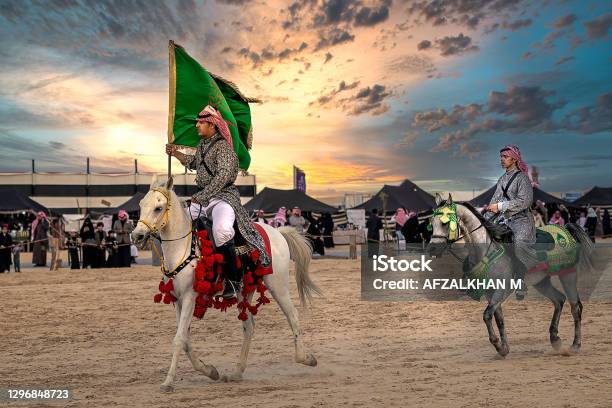 Saudi Arab Horse Rider With Saudi Arabia National Flag On Traditional Desert Safari Festival In Abqaiq Saudi Arabia 10jan2020 Stock Photo - Download Image Now