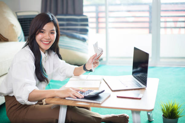 istock Asian women are using computers to work at home. According to the government's policy of working at home Caused by the Covid virus 1296849294