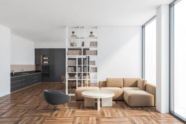 istock Living room with sofa and kitchen set, luxury studio apartment with window 1296853366