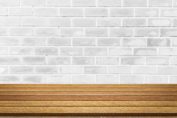 istock blur white retro brick pattern background of loft style interior kitchen room with sepia perspective wood table for show ,promote and advertise content or  product on display 1296854245