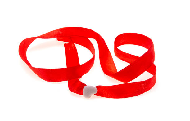 istock red ribbon with heart isolated 1296854254