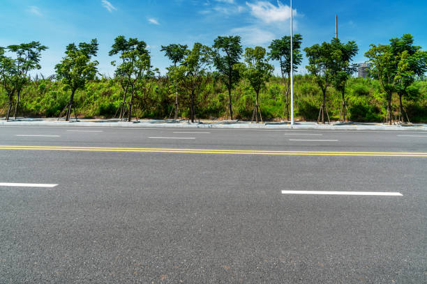 istock Empty urban road and buildings in China 1296854485