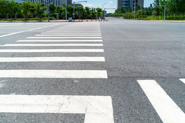 istock Empty urban road and buildings in China 1296854500