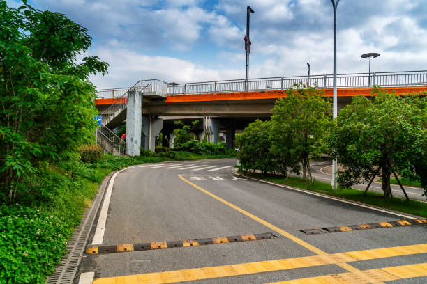 concrete structure and asphalt road space under the overpass in the city - 11321 imagens e fotografias de stock