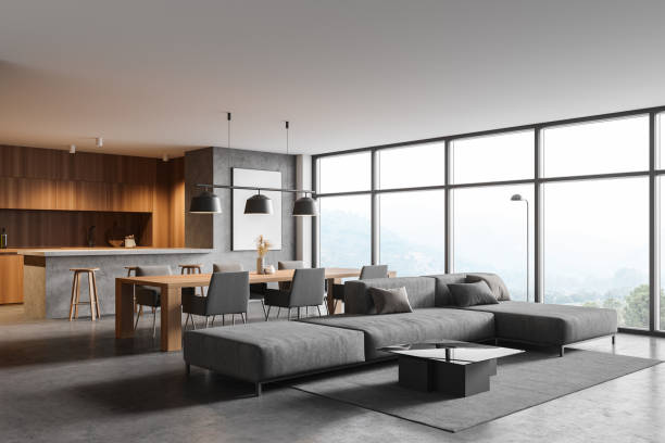 istock Panoramic gray and wooden living room corner 1296854766