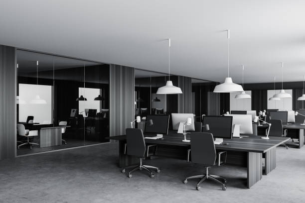 istock Gray and wooden open space office corner with doors 1296854821