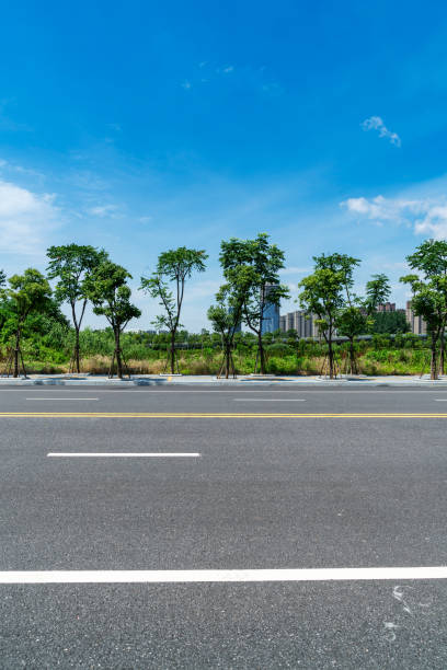 istock Empty urban road and buildings in China 1296854847