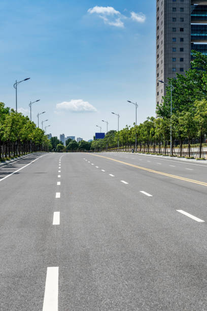istock Empty urban road and buildings in China 1296856009