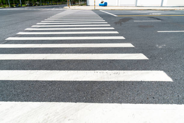 istock Zebra crossing on outdoor road 1296856019