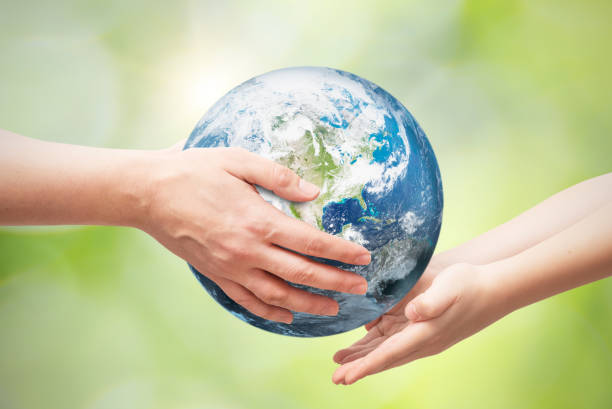 istock Earth globe in hands. World environment day 1296857044