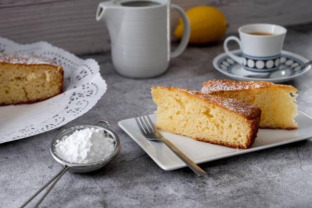 istock Lemon pound cake on rustic wooden background with lemon 1296858753
