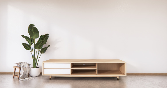 Gabinete de madera de diseño japonés en la sala de estar zen estilo fondo de pared vacía.3D representación photo