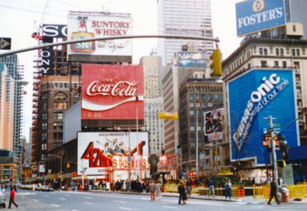 vintage retro view of billboards, neon signs on times square in new york - marquis imagens e fotografias de stock