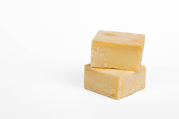 istock Handmade yellow soap on a white background 1296870980
