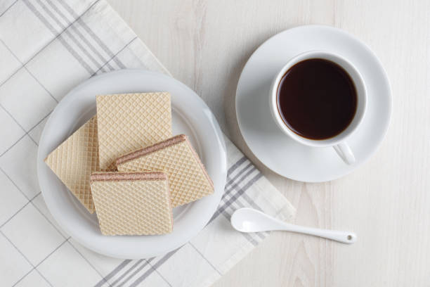 istock Wafers with filling and coffee 1296872101