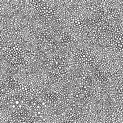 Vector seamless abstract pattern from white dots, circles and round spots on a black background. Animal print, wallpaper, batik paint, wrapping paper, grunge texture