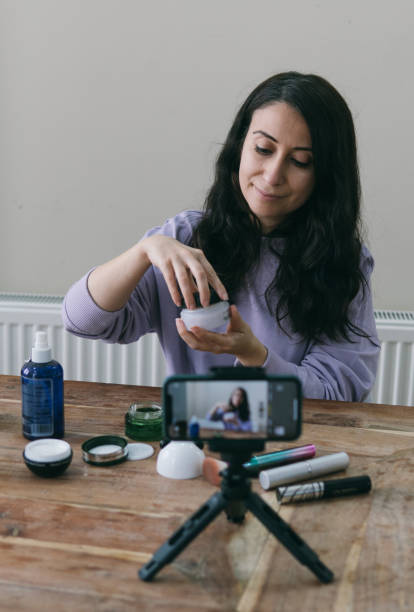 istock young woman make up blogger influencer 1296872556