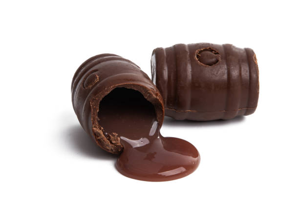 istock chocolate barrels with liquor isolated 1296875411