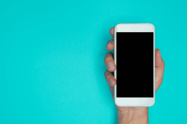 istock Woman Holding Smart Phone 1296877104