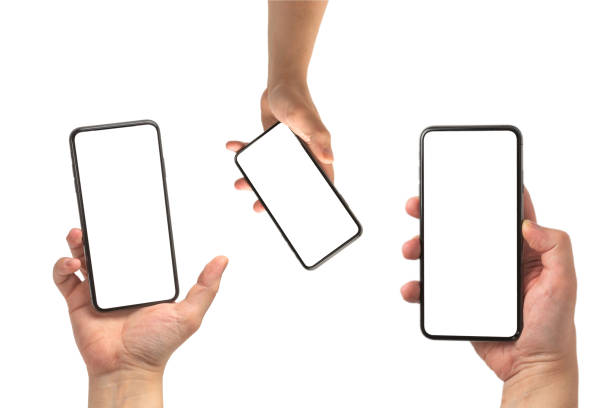 istock Smart phone in man hand isolated on white background.  White screen. 1296878121