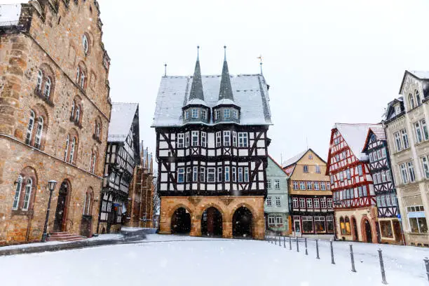 View of Alsfeld town hall, Weinhaus and church on main square, Germany. Historic city in Hesse, Vogelsberg, with old medieval frame half-timbered houses called Fachwerk or Fachwerhaus in German