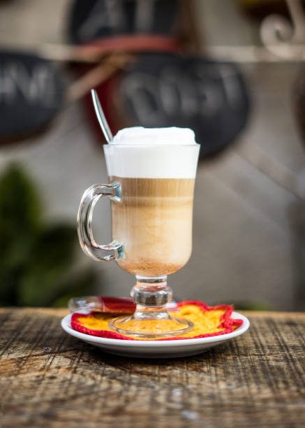 istock coffee latte is on the wooden table focus foreground vertical photo 1296878893