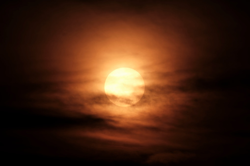 Sun and sky with clouds at sunset