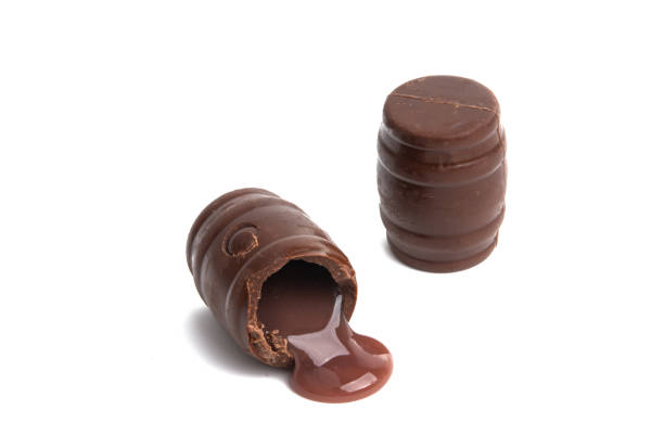 chocolate barrels with liquor isolated on white background