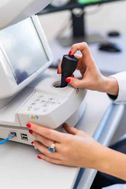 istock Doctor`s hands work on professional MRI equipment. Scanning with CT. Selective focus. 1296880249