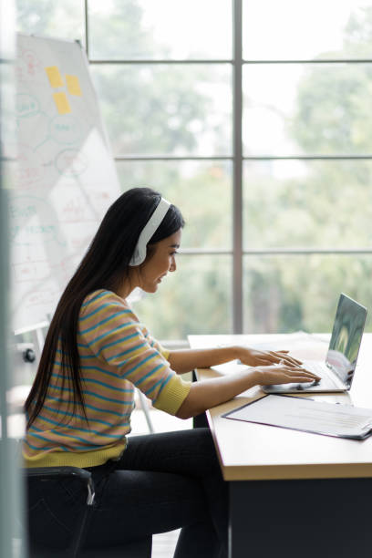 istock Young woman working from home office 1296881490