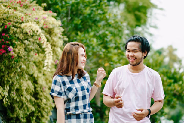 istock Beautiful Couple Walking Together During Summer 1296881661