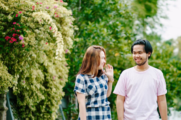 istock Beautiful Couple Walking Together During Summer 1296881666