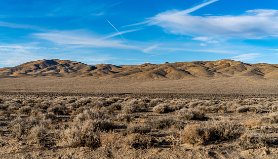 Wild west California Mojave Desert with mountains in background