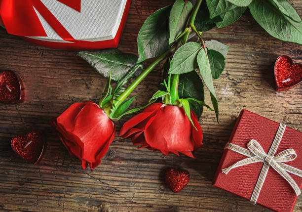 istock Gift box on a wooden background. Valentine's Day gift.selectiv focus 1296884696