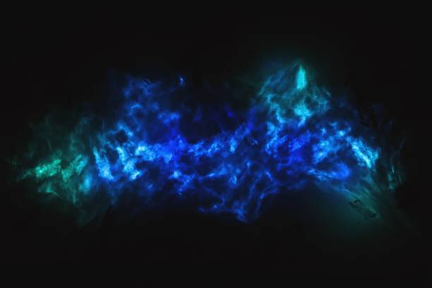 istock Blue, green and turquoise colors on a black background 1296884777