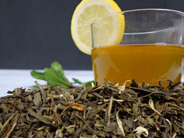 istock Green tea cup with a lemon wedge 1296889854