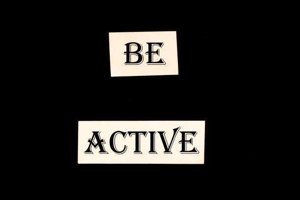 istock Be active on a black background. Concept of planning and challenge 1296890546